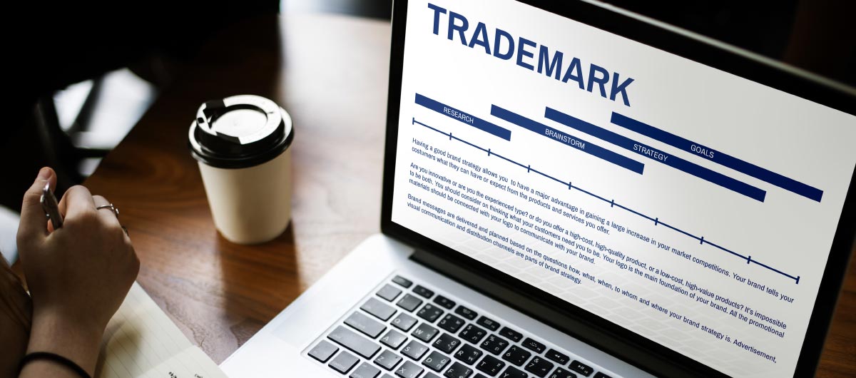 Intellectual property barrister Mark Engelman. Trademarks. Laptop looking at trademark info.